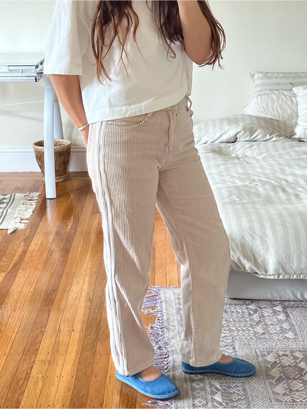 UNIF cream corduroy pants with white athletic stripe